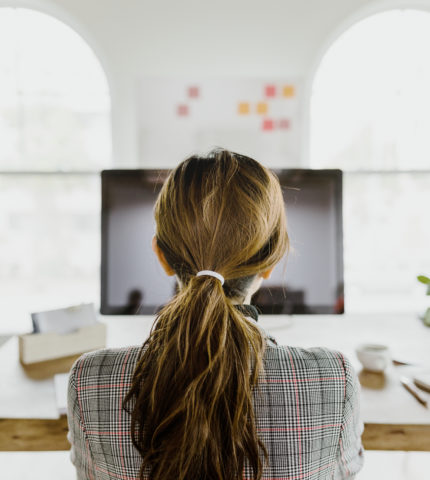 Businesswoman working on a computer in the office
